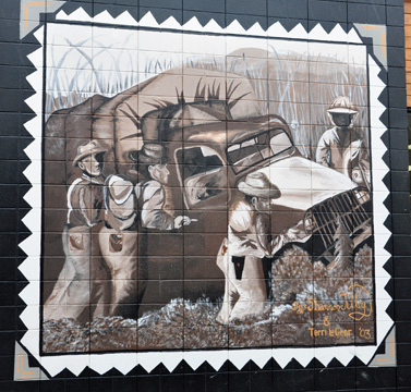 mural - scenes of the construction of the Alaska Highway